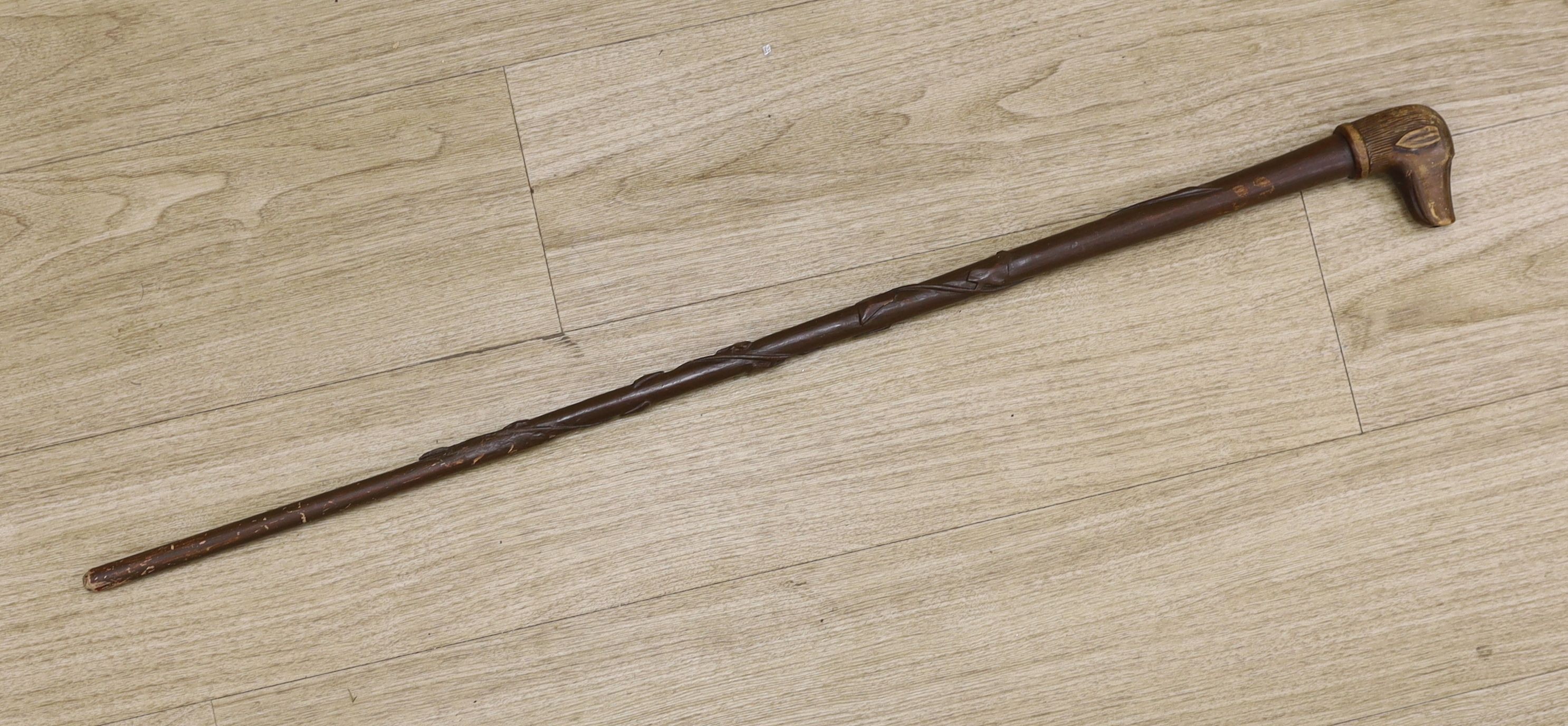 A Folk art carved dog-head walking cane - 92.5cm